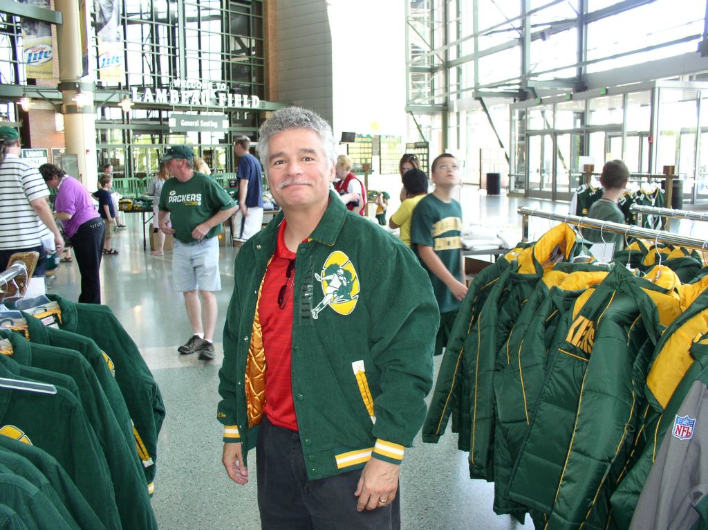 Ed tries on a Packer jacket